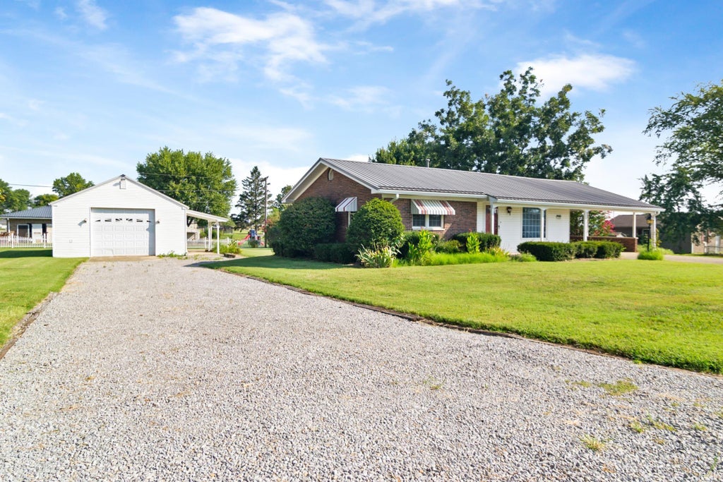 Photo of 33 E Third Avenue, Poseyville, IN 47633 (MLS # 202637131)
