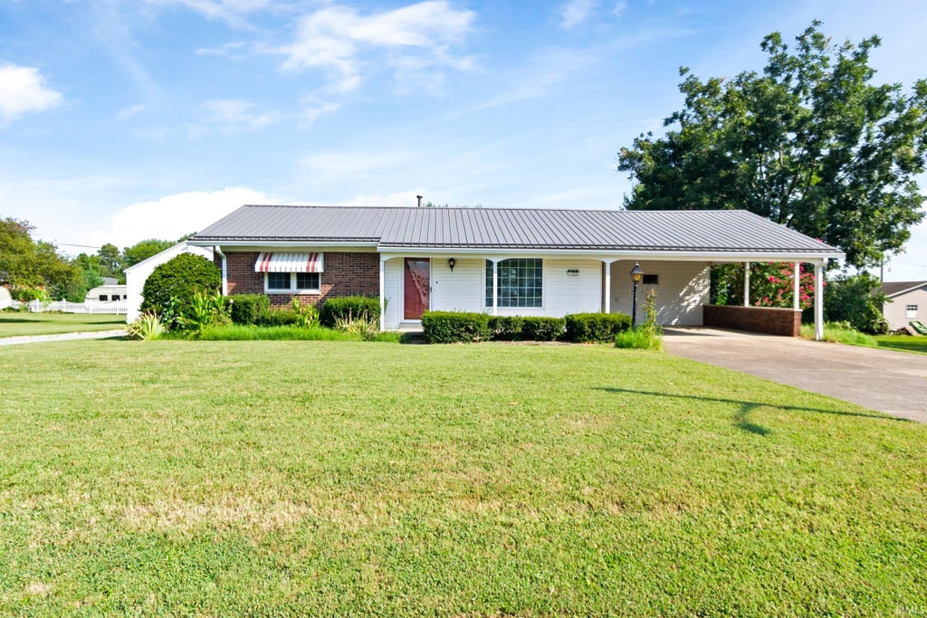 Photo of 33 E Third Avenue, Poseyville, IN 47633 (MLS # 202637131)