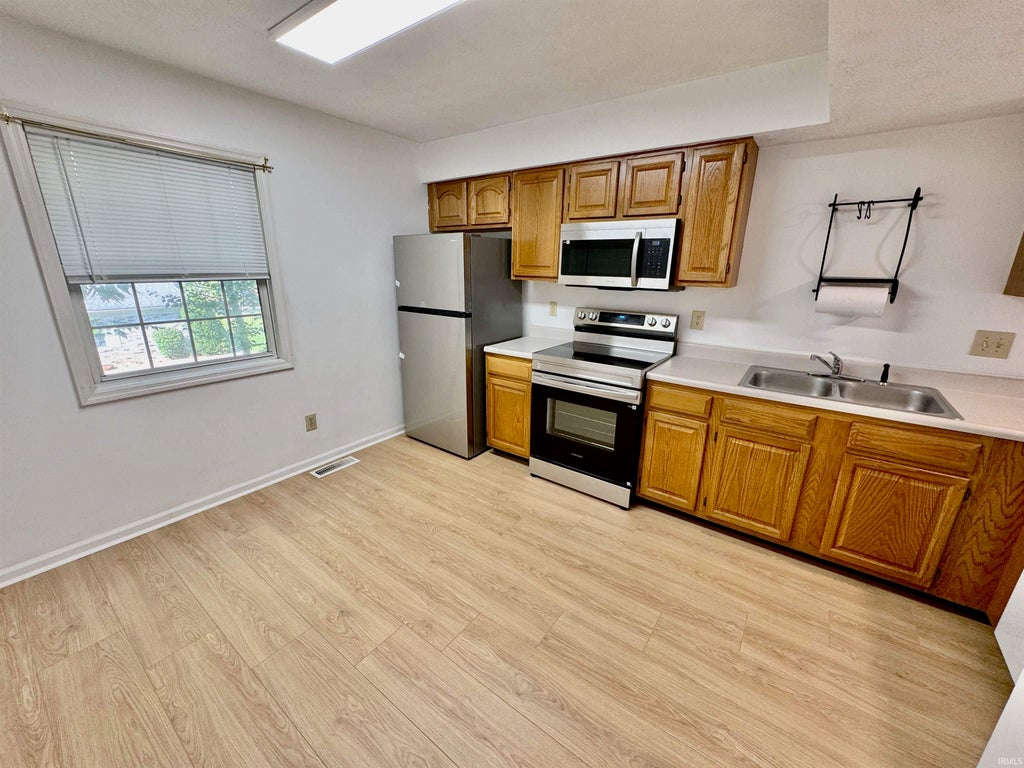 Photo of 729 E Sherwood Hills Drive, Bloomington, IN 47401 (MLS # 202636841)