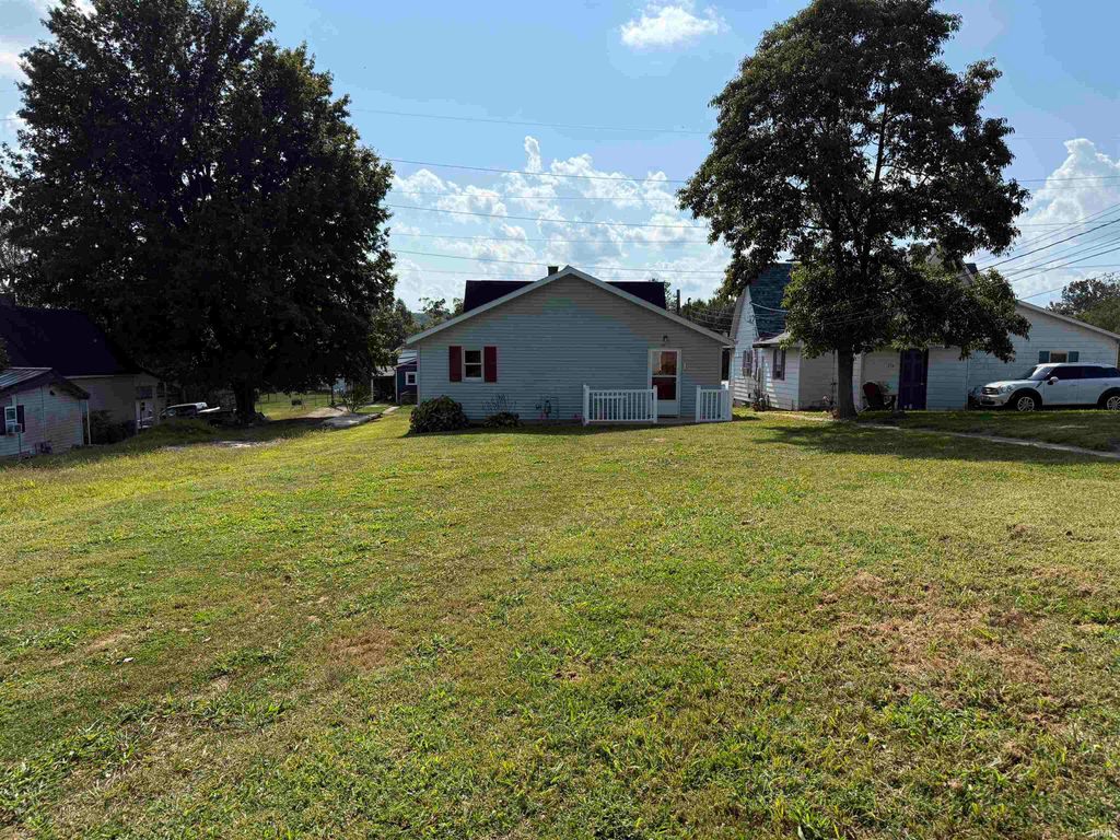 Photo of 238 Indiana Ave Ave, Oolitic, IN 47451 (MLS # 202537432)