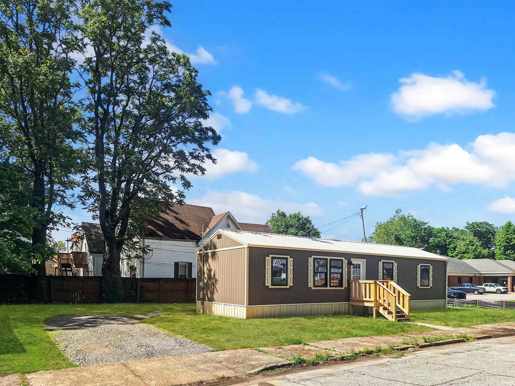 Photo of 319 N Fourth Avenue, Evansville, IN 47710 (MLS # 202620087)