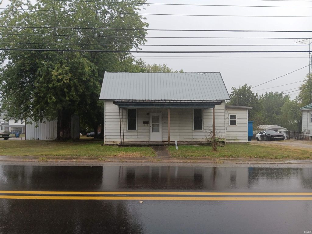 Photo of 303 W Elnora Street, Odon, IN 47562 (MLS # 202536057)