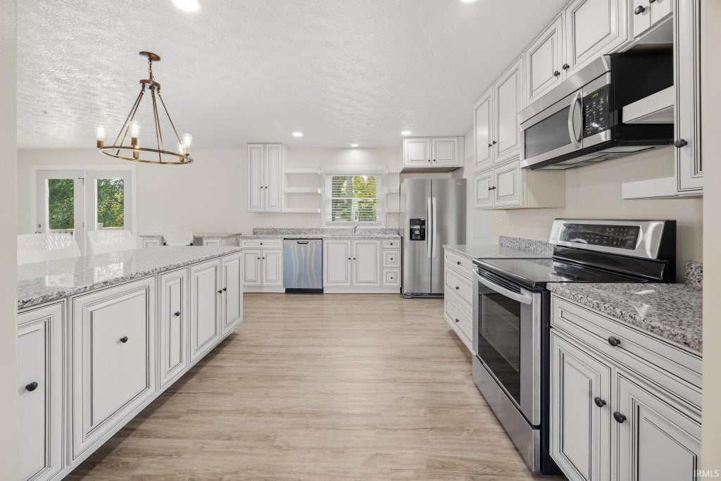 Photo of 407 E 12th Street, Huntingburg, IN 47542 (MLS # 202638639)