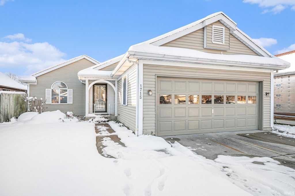 Photo of 1715 Woodland Drive, Elkhart, IN 46514 (MLS # 202548304)