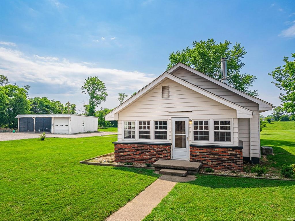 Photo of 8897 S 1075 W Road, Owensville, IN 47665 (MLS # 202549637)