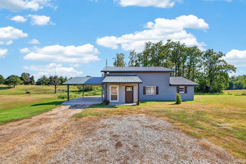 Photo of 1002 W Morton Street, Oakland City, IN 47660 (MLS # 202637313)