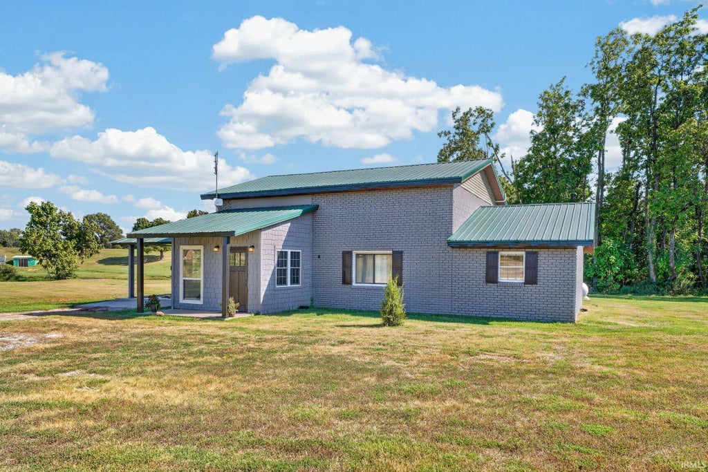 Photo of 1002 W Morton Street, Oakland City, IN 47660 (MLS # 202637313)
