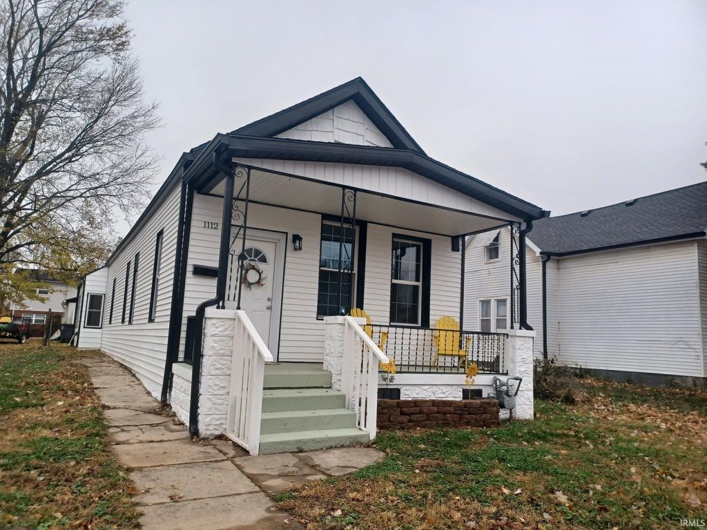 Photo of 1112 W Iowa Street, Evansville, IN 47710 (MLS # 202546675)