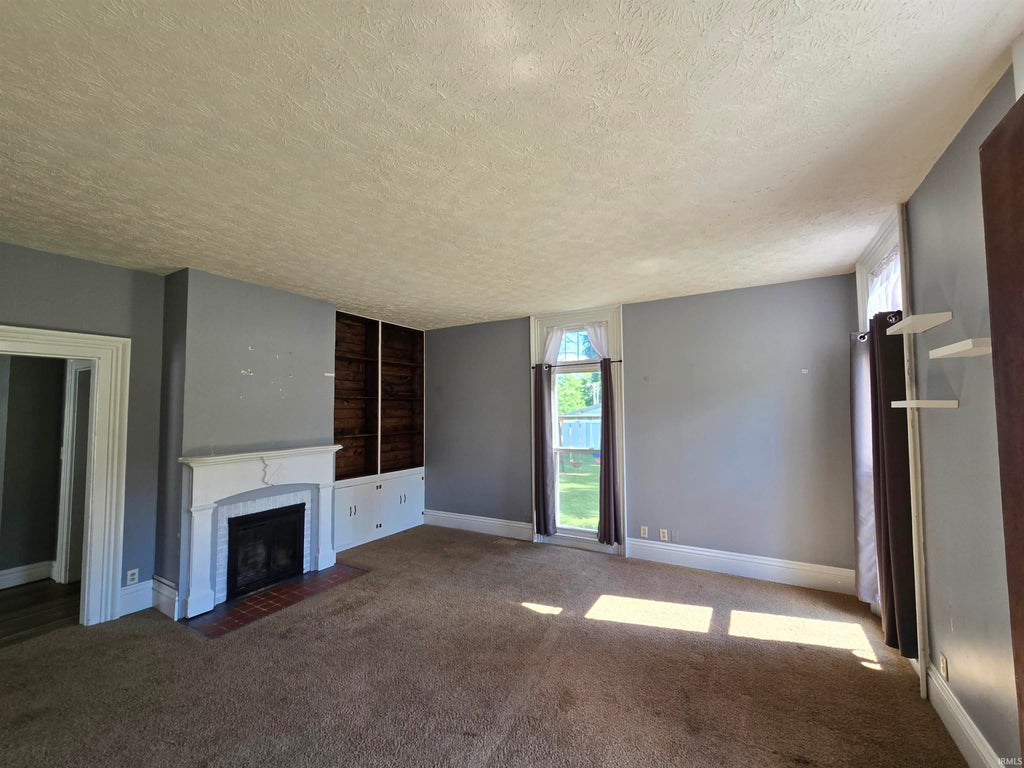 Photo of 311 Lincoln Street, Williamsport, IN 47993 (MLS # 202630749)