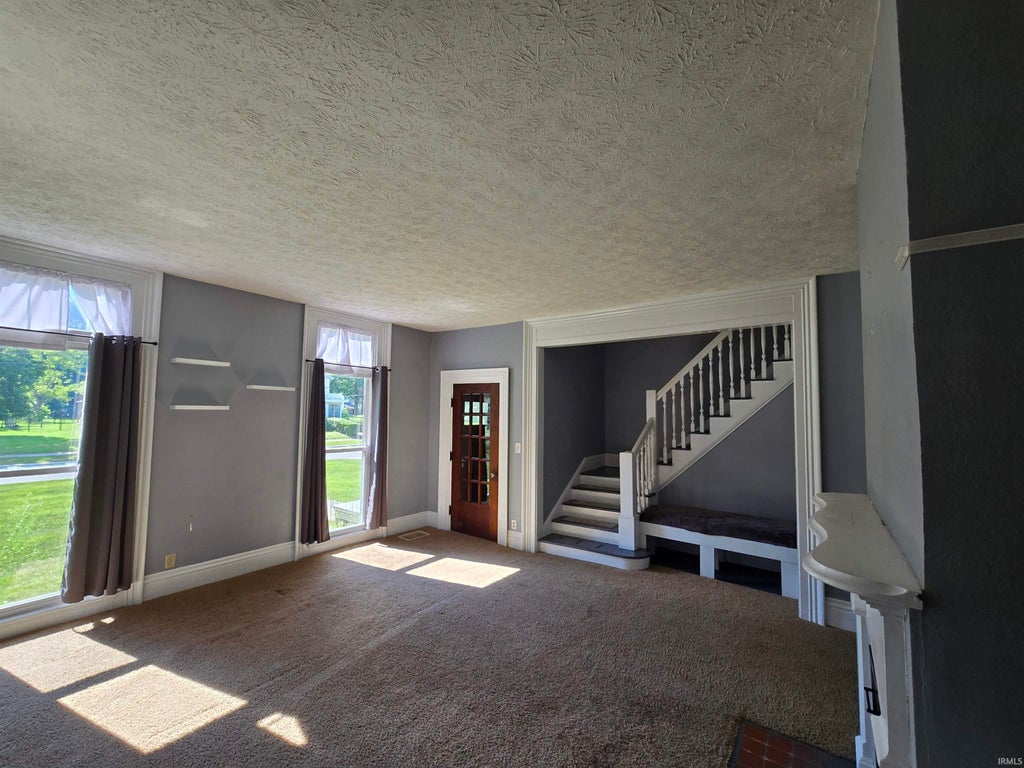 Photo of 311 Lincoln Street, Williamsport, IN 47993 (MLS # 202630749)