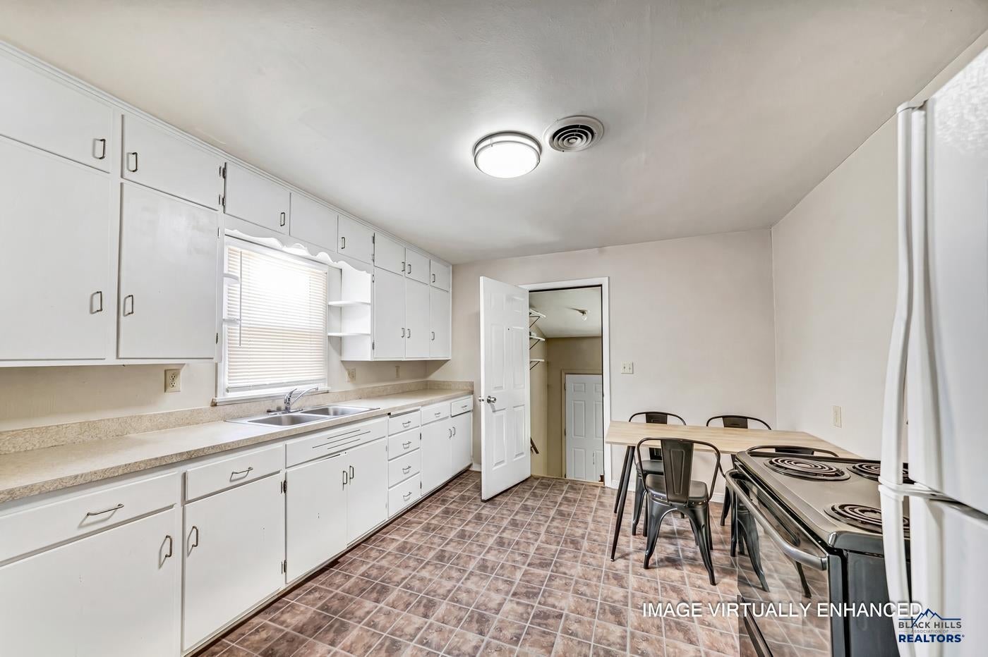 211 E MONROE AVE