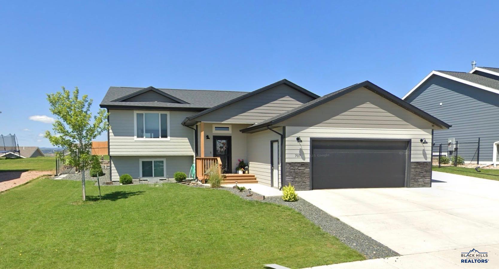 Photo 1 of 29 — 707 SUMMERFIELD DR, Rapid City, SD 57703
