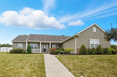 Photo of 121 Bluegrass Drive, Wapakoneta, OH 45895 (MLS # 1041651)