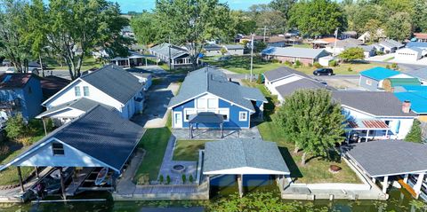 Photo of 11546 Horseshoe Channel Drive, Lakeview, OH 43331 (MLS # 1036831)