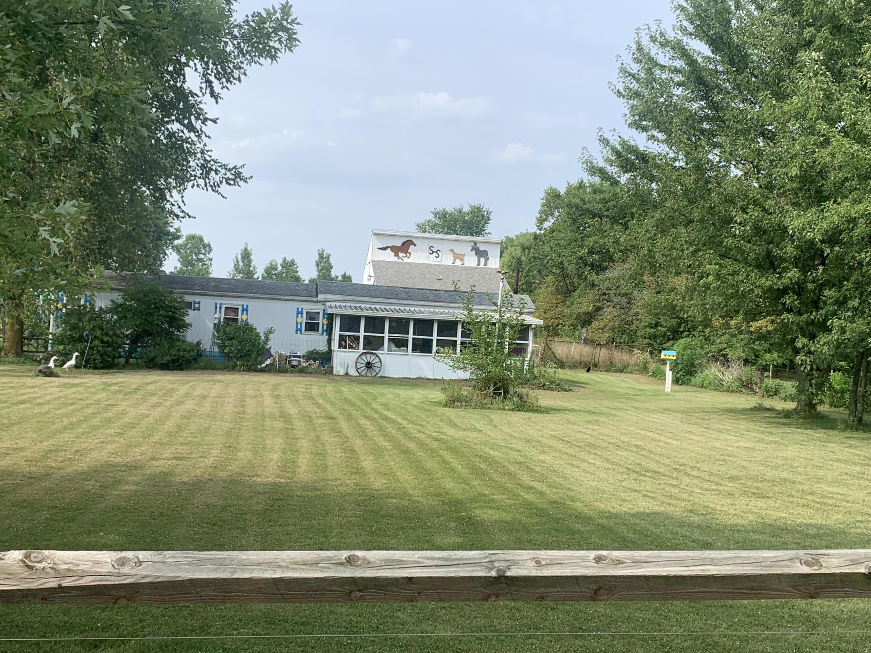 Photo 1 of 2 of 17663 National Road mobile home