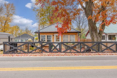 Photo of 211 W Main Street, Russells Point, OH 43348 (MLS # 1042340)