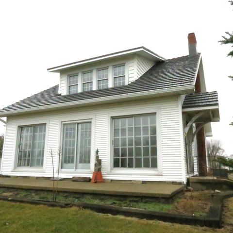 Photo of 102 E Main Street, Anna, OH 45302 (MLS # 1044108)