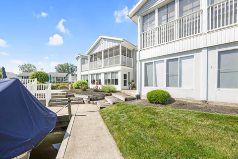 Photo of 7480 Dunns Pond Circle #12, Russells Point, OH 43348 (MLS # 1046182)