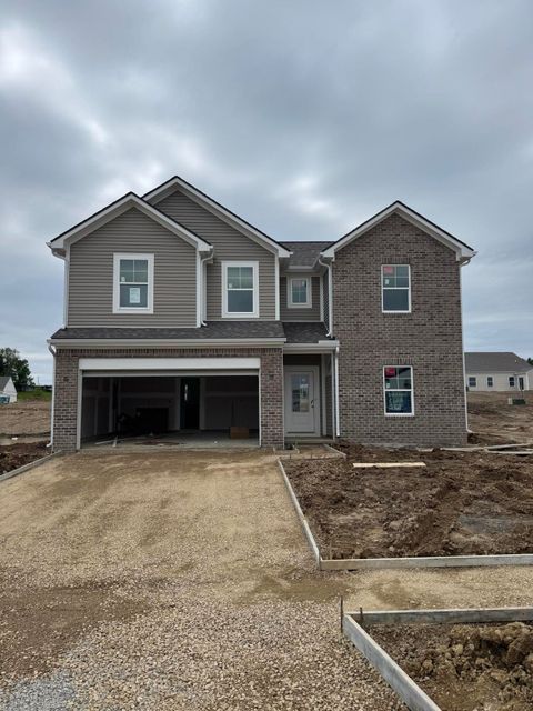 Photo of 328 Dylan Drive, Bellefontaine, OH 43311 (MLS # 1044824)