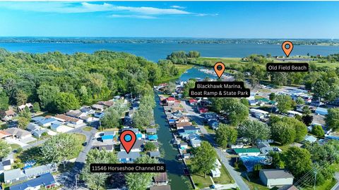 Photo of 11546 Horseshoe Channel Drive, Lakeview, OH 43331 (MLS # 1036831)