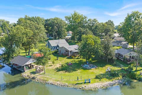 Photo of 7711 Edgewater Avenue, Huntsville, OH 43324 (MLS # 1047553)