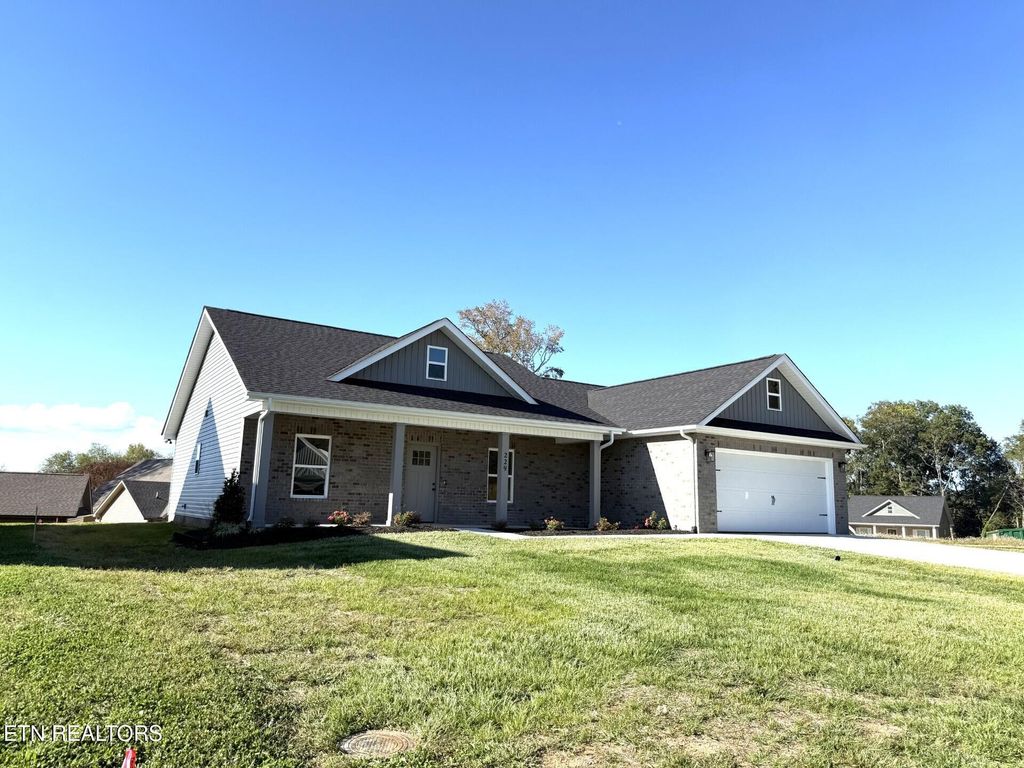 Photo of 229 Mossy Rock Rd, Clinton, TN 37716 (MLS # 1305237)