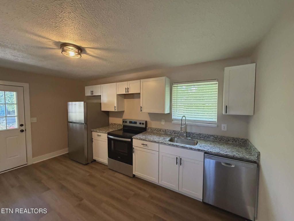 Photo of 507 W 4th St, LaFollette, TN 37766 (MLS # 1340777)