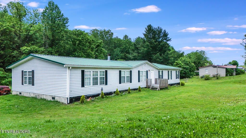 Photo of 3231 Lake City Hwy, Rocky Top, TN 37769 (MLS # 1302134)