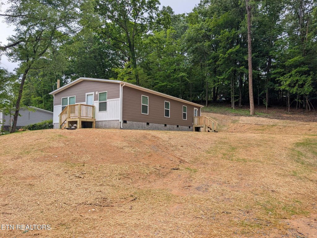 Photo of 311 Molyneux St, Rockwood, TN 37854 (MLS # 1339632)
