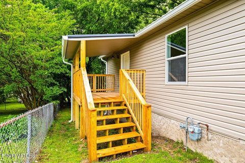 Tiny photo for 818 S Cumberland Ave Ave, LaFollette, TN 37766 (MLS # 1342174)