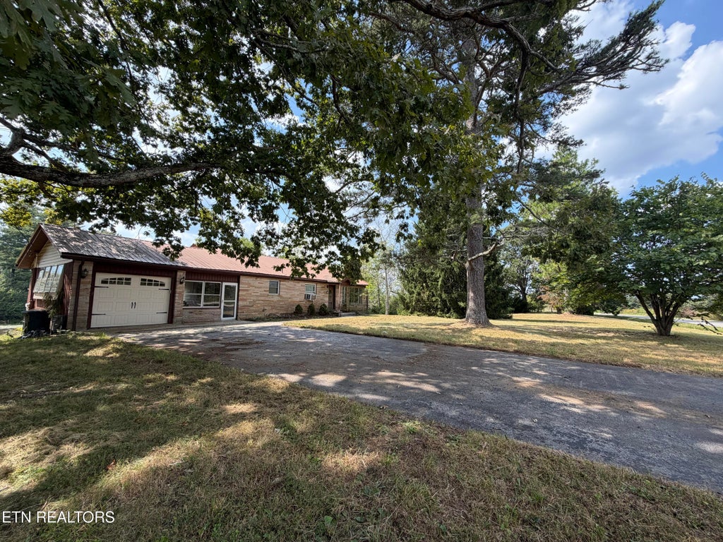 Photo of 6111 Nashville Hwy, Deer Lodge, TN 37726 (MLS # 1356108)