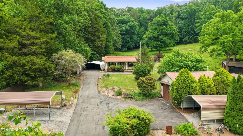 Photo of 391 County Road 57 (27 acres), Riceville, TN 37370 (MLS # 1342712)