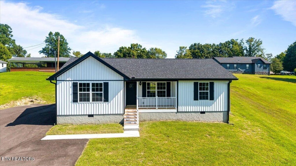Photo of 1822 Loop Rd, LaFollette, TN 37766 (MLS # 1353450)