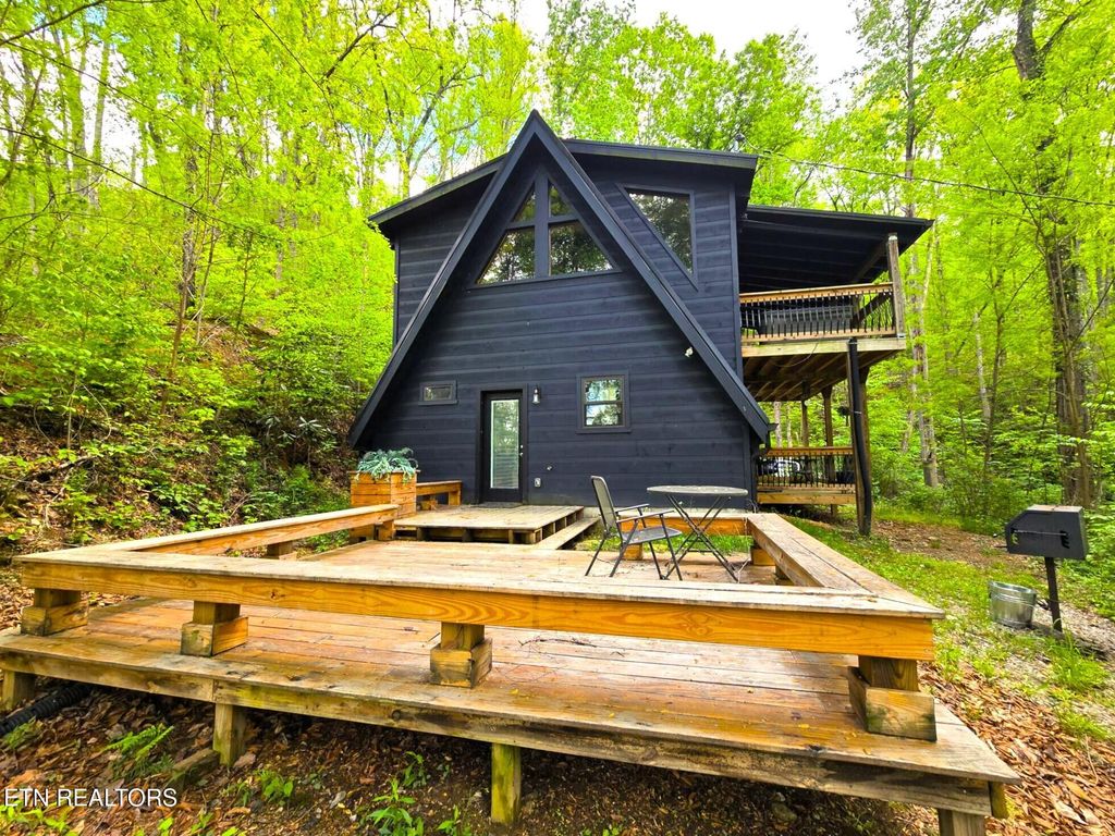 Photo of 1020 Deep Hollow Rd, Gatlinburg, TN 37738 (MLS # 1298857)