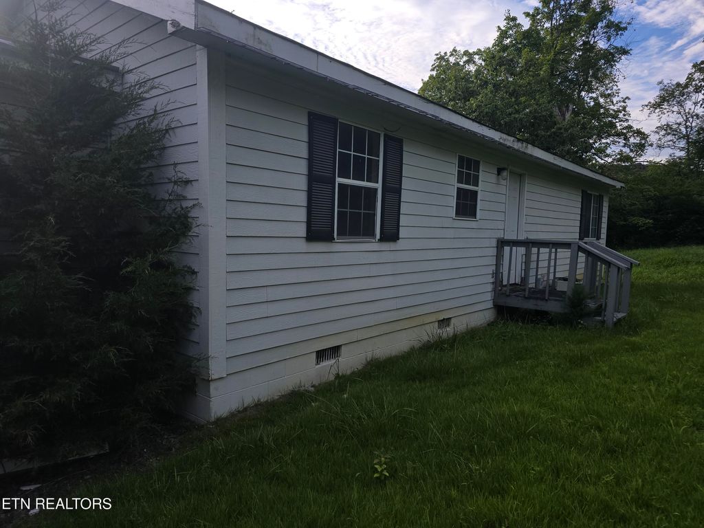 Photo of 404 Cedar Fork Rd, Tazewell, TN 37879 (MLS # 1325736)