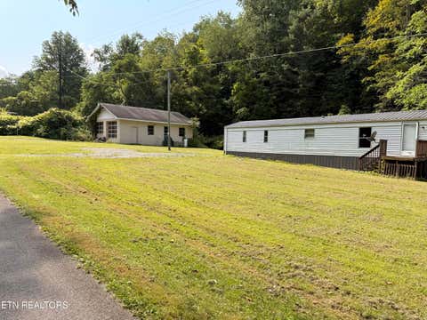 Photo of 920 Left Poor Valley Rd, Pennington Gap, VA 24277 (MLS # 1351364)