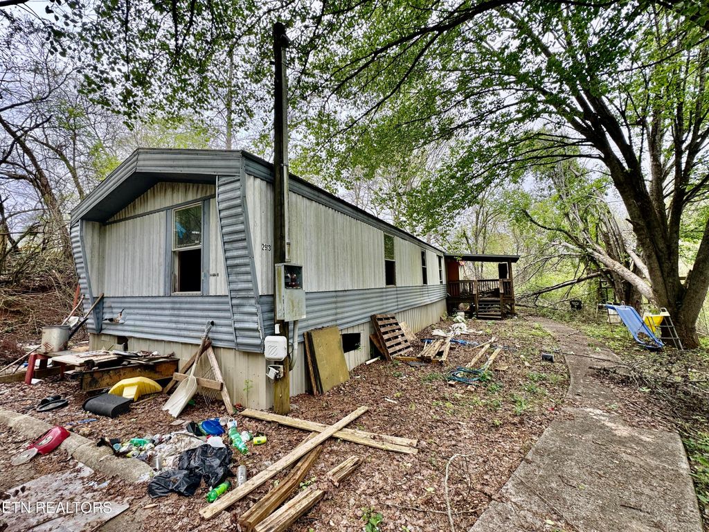 Photo of 136 Sugar Rd, Oliver Springs, TN 37840 (MLS # 1260411)