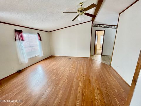 Tiny photo for 713 E Kentucky Ave, LaFollette, TN 37766 (MLS # 1328286)