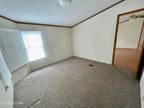 Tiny photo for 713 E Kentucky Ave, LaFollette, TN 37766 (MLS # 1328286)