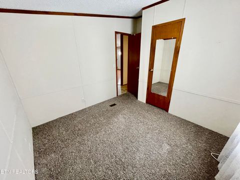 Tiny photo for 713 E Kentucky Ave, LaFollette, TN 37766 (MLS # 1328286)