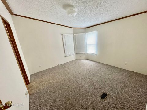 Tiny photo for 713 E Kentucky Ave, LaFollette, TN 37766 (MLS # 1328286)