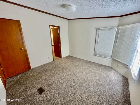 Tiny photo for 713 E Kentucky Ave, LaFollette, TN 37766 (MLS # 1328286)