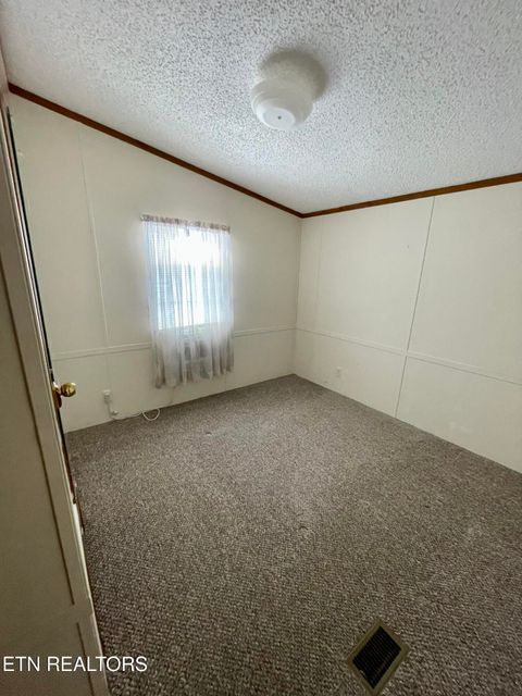 Tiny photo for 713 E Kentucky Ave, LaFollette, TN 37766 (MLS # 1328286)