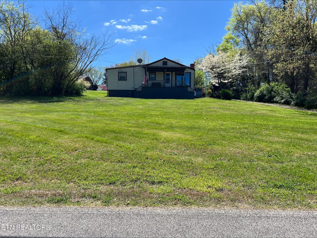 Photo of 1229 Sugar Fork Rd Rd, Dandridge, TN 37725 (MLS # 1258492)