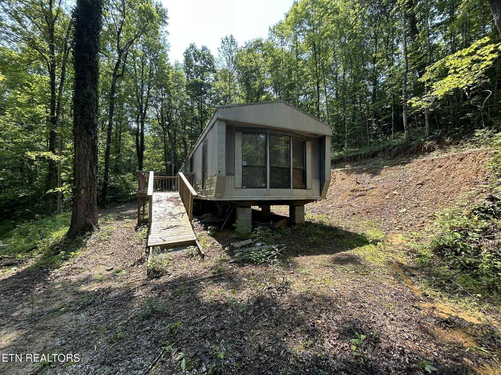 Photo of 152 Hanging Rock Rd, Harriman, TN 37748 (MLS # 1303162)