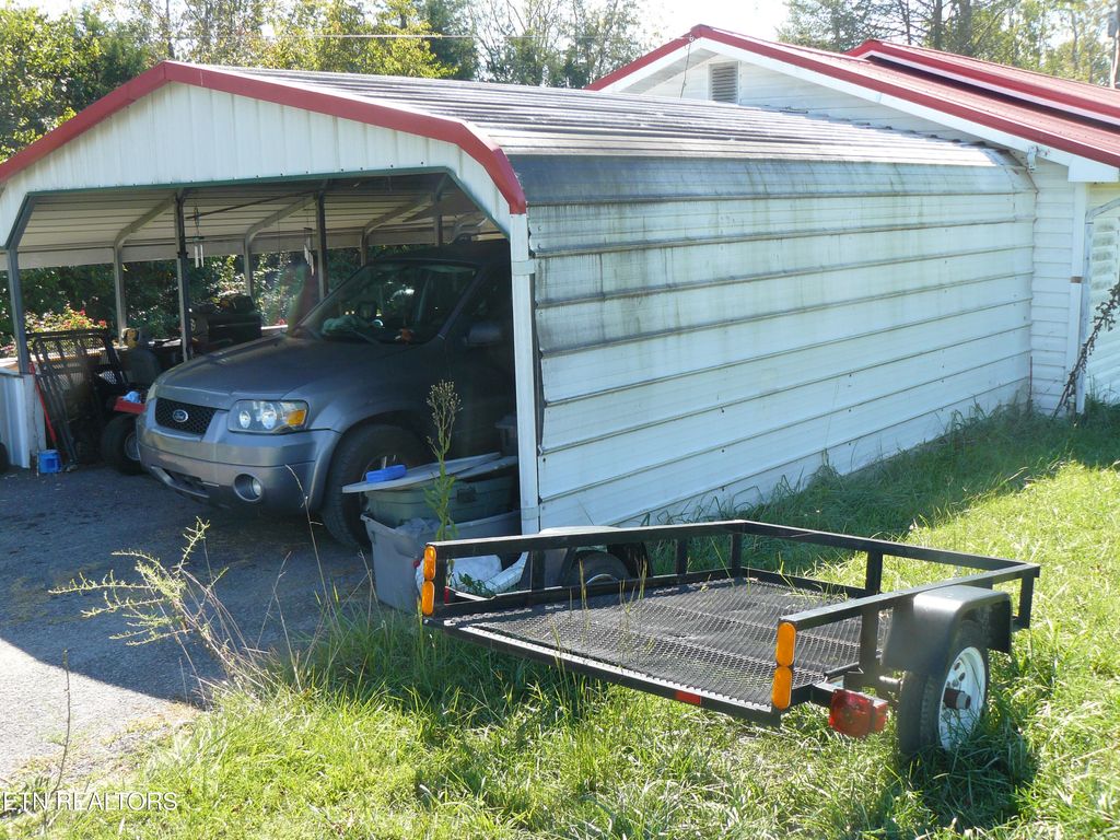 Photo of 701 Russell Rd, New Tazewell, TN 37825 (MLS # 1315537)