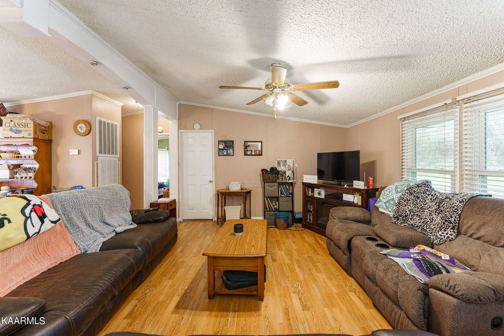 Photo of 318 E Spring St, Oliver Springs, TN 37840 (MLS # 1220238)