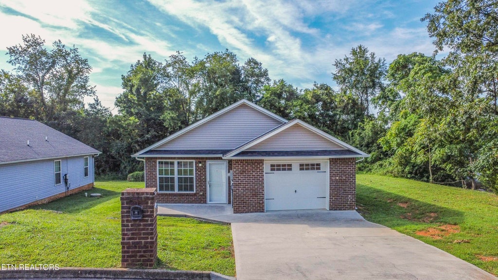 Photo of 1702 Watauga St, Sevierville, TN 37876 (MLS # 1353250)