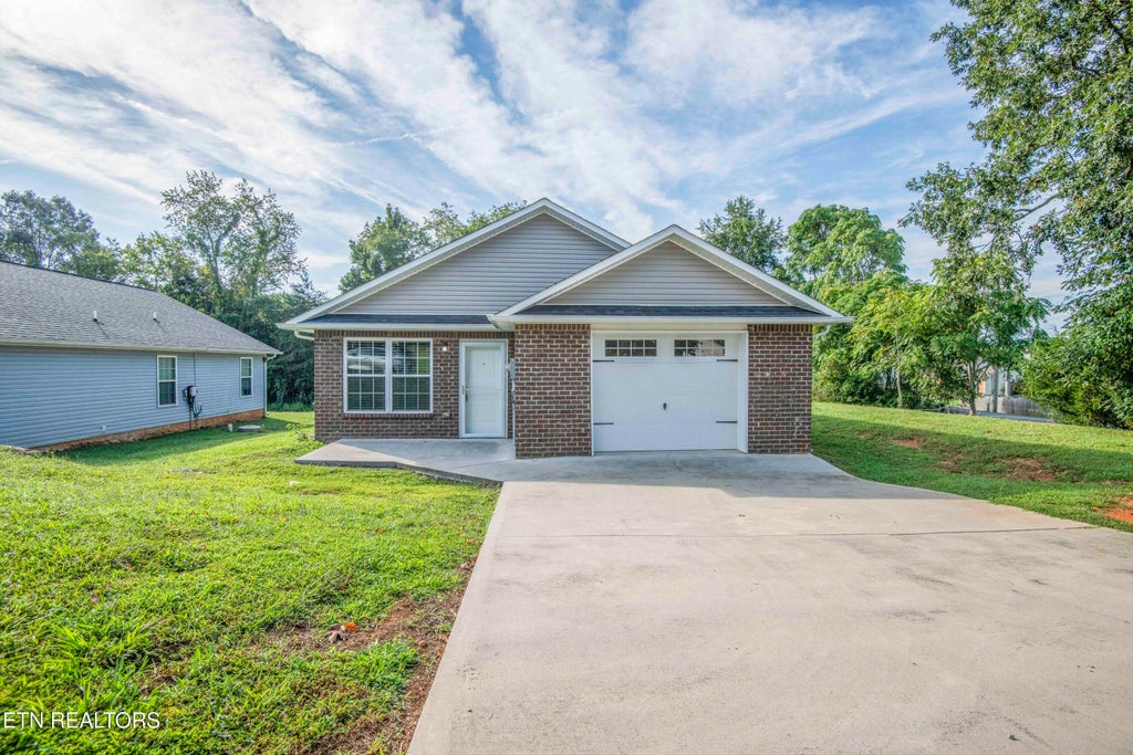 Photo of 1702 Watauga St, Sevierville, TN 37876 (MLS # 1353250)