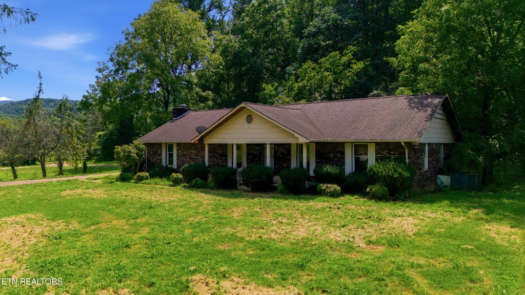 Photo of 1588 TN-116, Caryville, TN 37714 (MLS # 1353063)